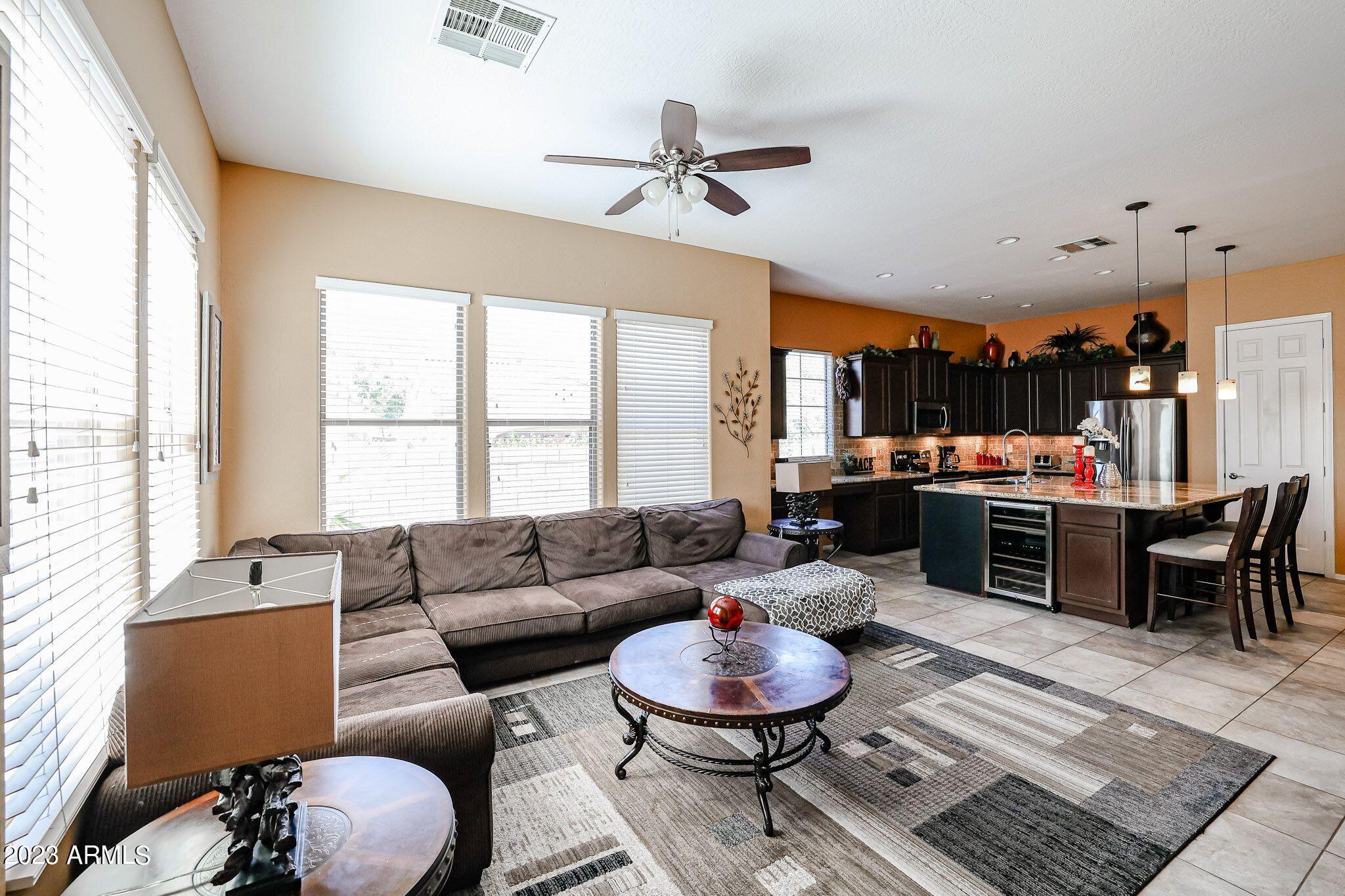3952 North Point Ridge Road Buckeye, AZ 85396 - Photo 16 of 31 Family & Kitchen