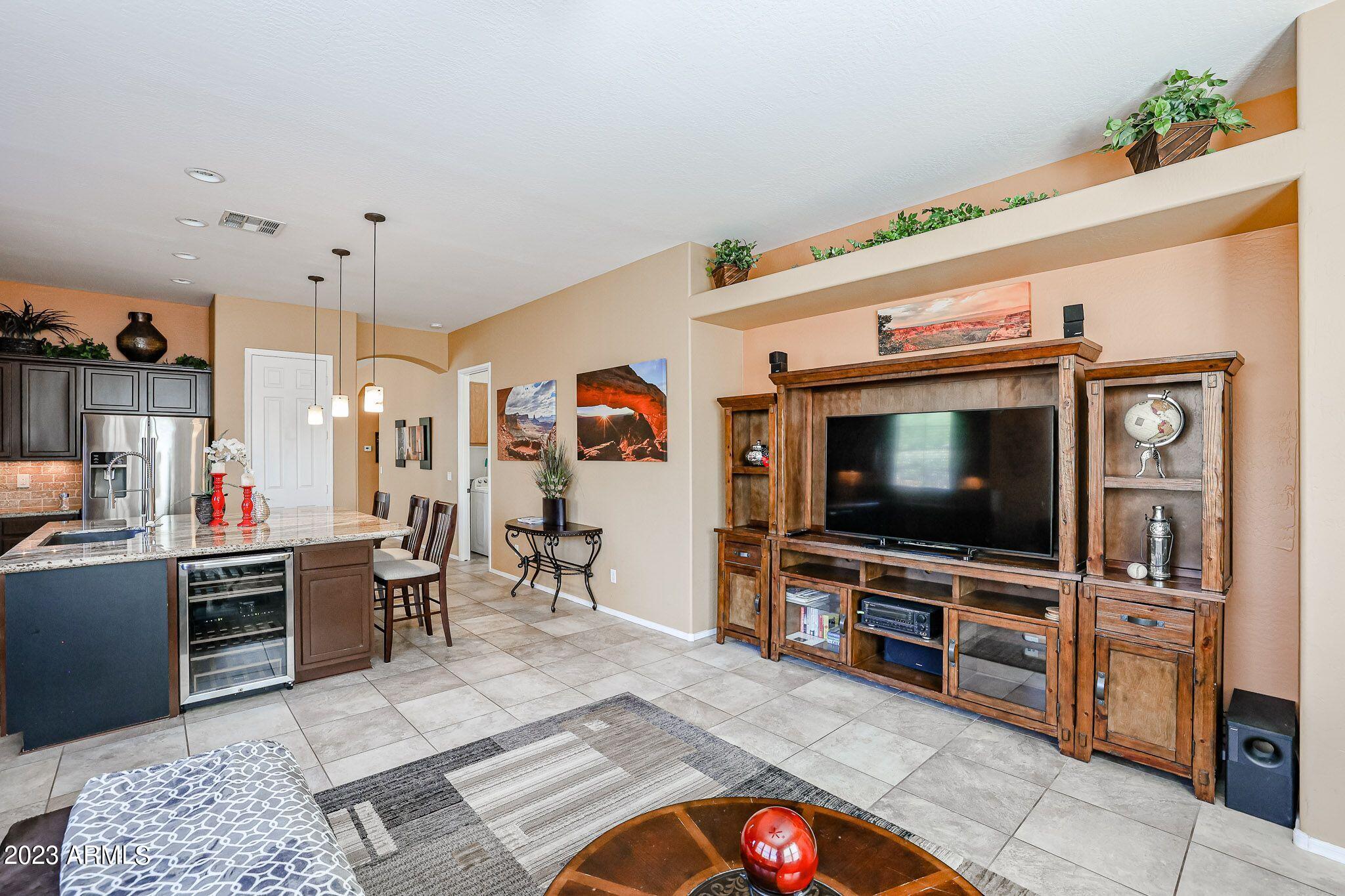 3952 North Point Ridge Road Buckeye, AZ 85396 - Photo 18 of 31 Relax in the family room