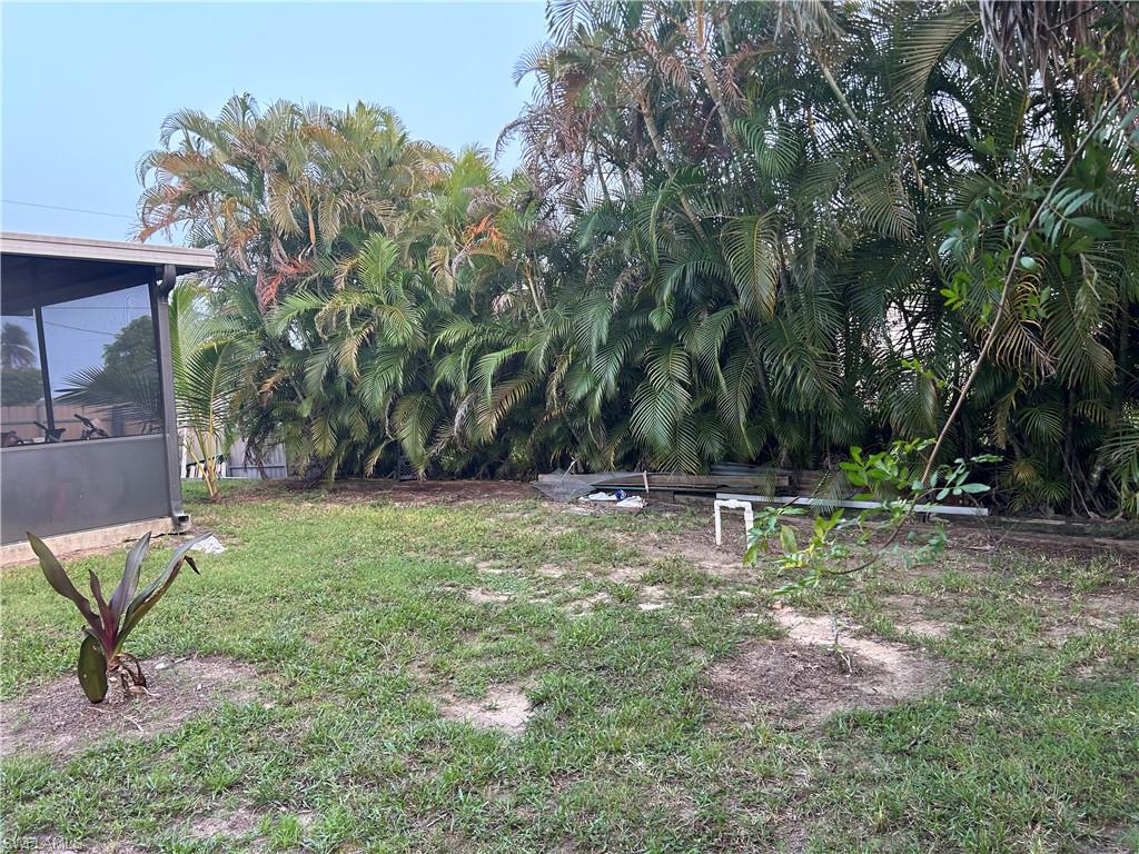 2049 50th Street Southwest Naples, FL 34116 - Photo 7 of 7 a view of backyard with a patio