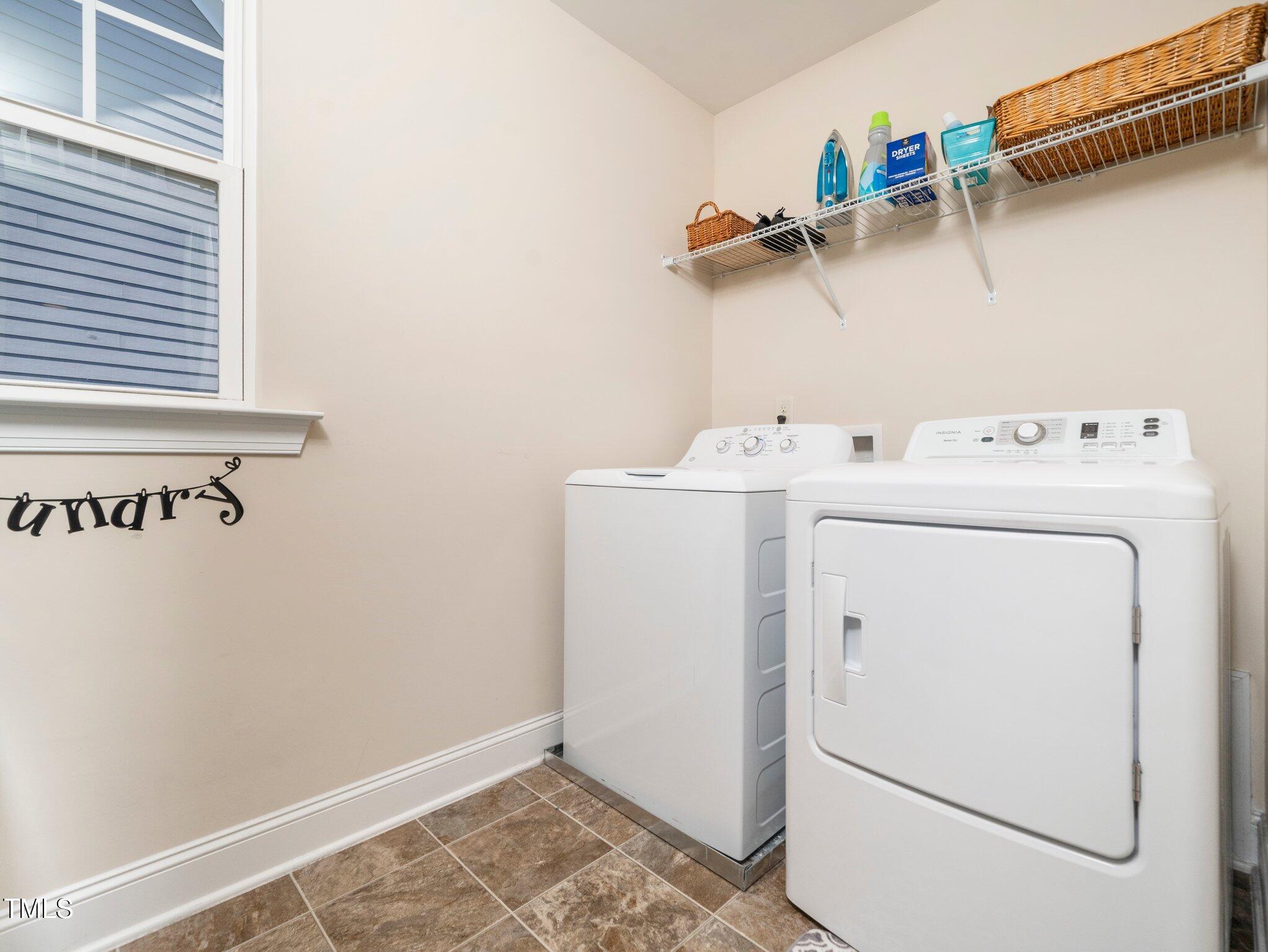 4508 Brintons Cottage Street Raleigh, NC 27616 - Photo 27 of 46 a utility room with dryer and washer