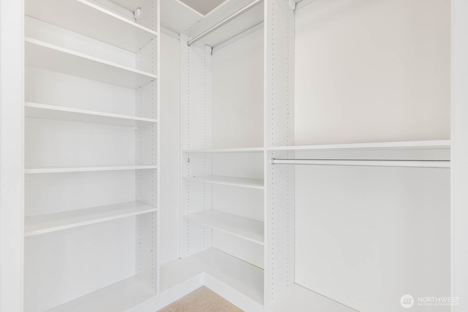 819 Virginia Street, Unit 3303 Seattle, WA 98101 - Photo 12 of 29 a view of walk in closet with empty racks