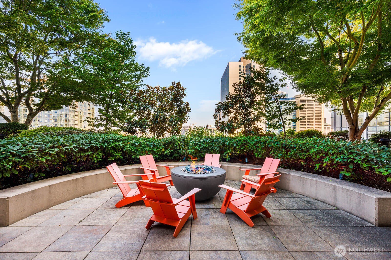819 Virginia Street, Unit 3303 Seattle, WA 98101 - Photo 18 of 29 a backyard of a house with outdoor seating