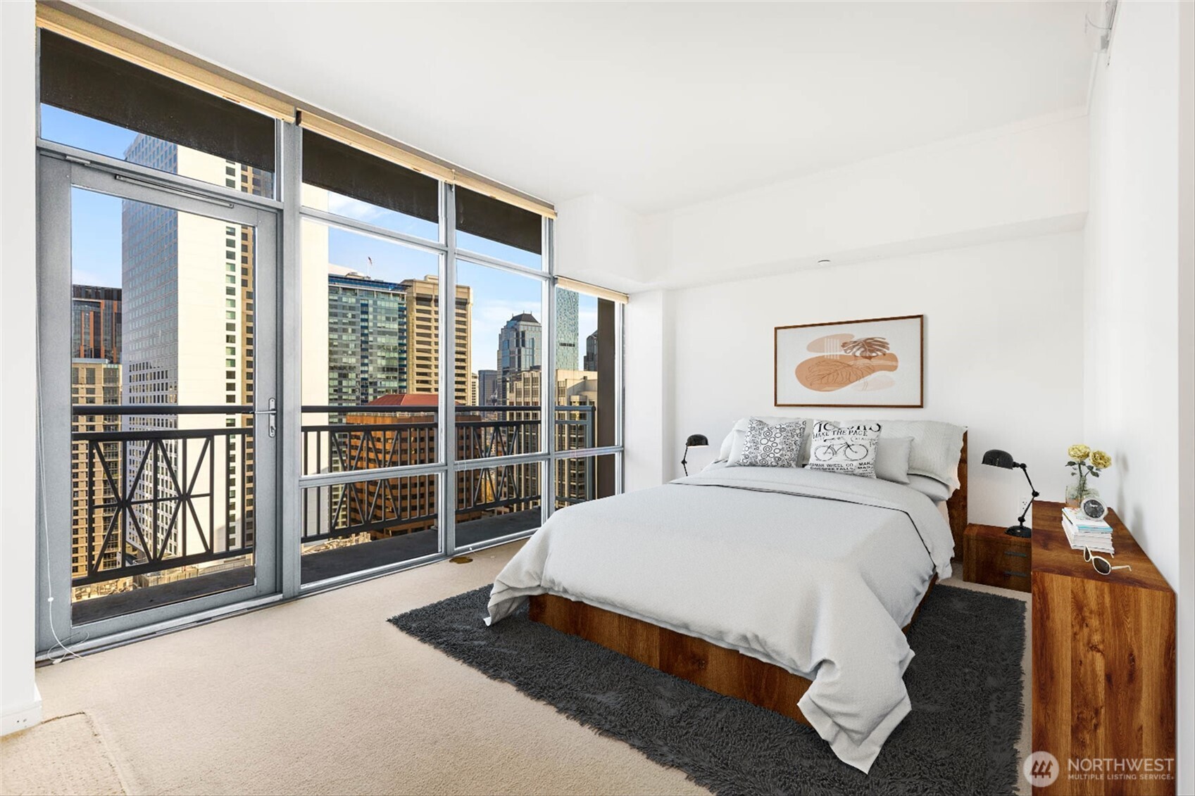 819 Virginia Street, Unit 3303 Seattle, WA 98101 - Photo 9 of 29 a spacious bedroom with a bed and a large window