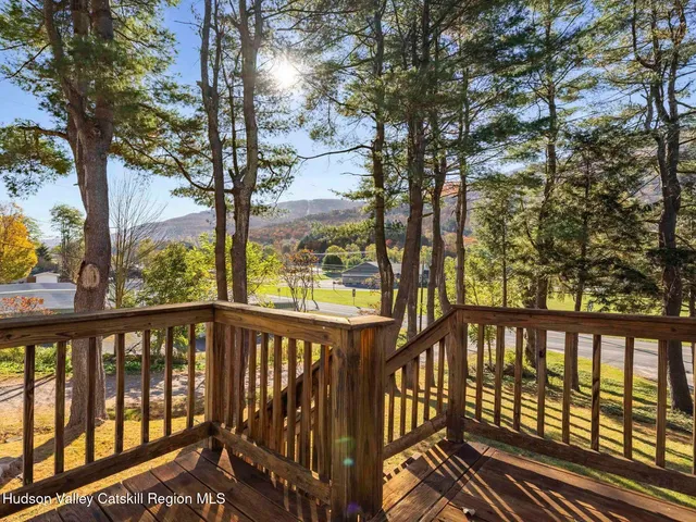 a view of a wooden roof deck