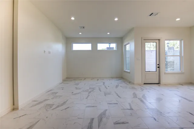 an empty room with windows