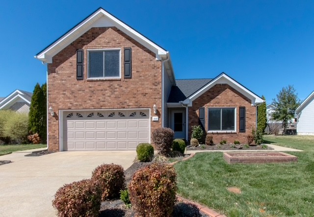 2112 Cason Trail Murfreesboro, TN 37128 - Photo 1 of 25 a front view of a house with a yard