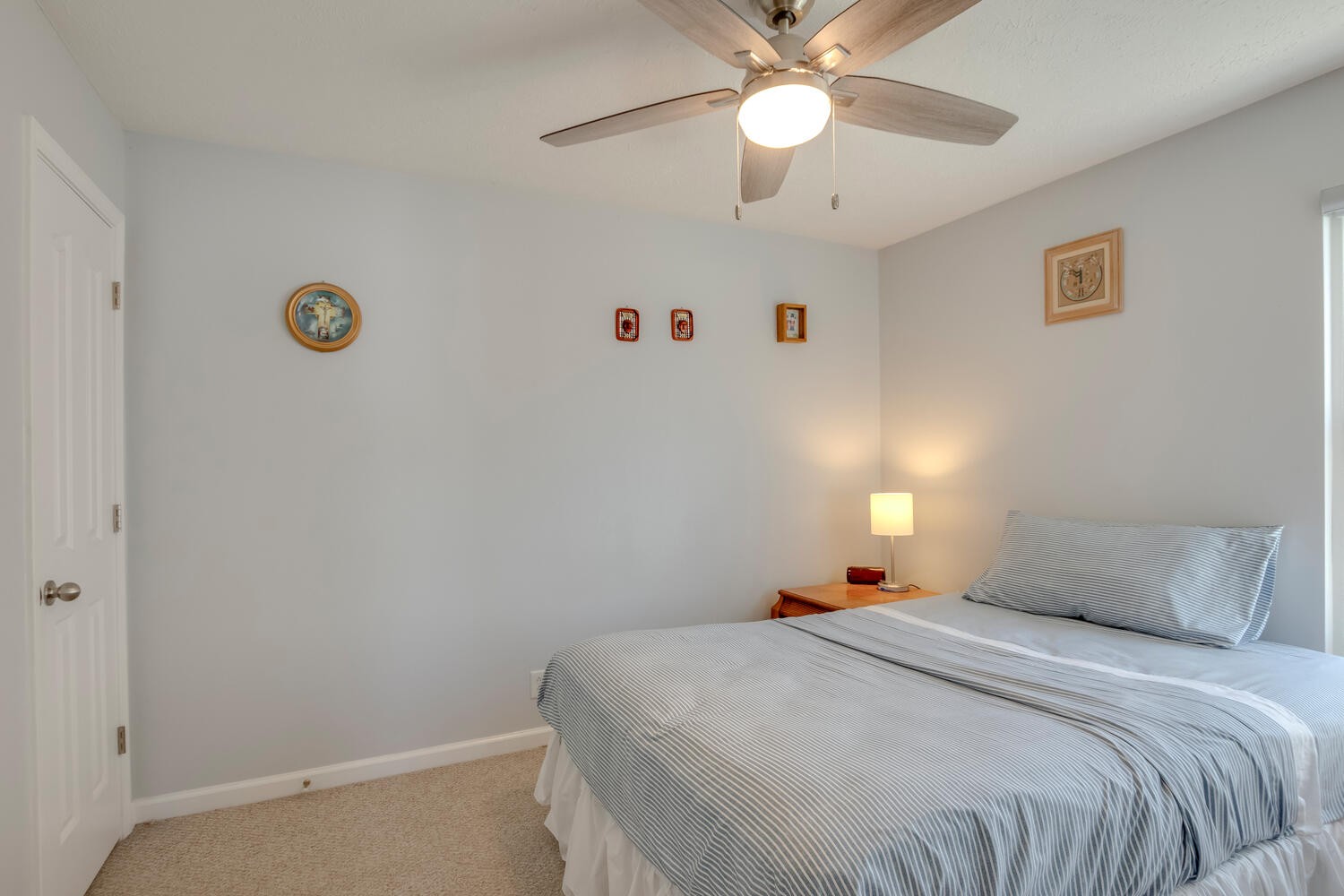 2112 Cason Trail Murfreesboro, TN 37128 - Photo 15 of 25 a bedroom with a bed and a chandelier