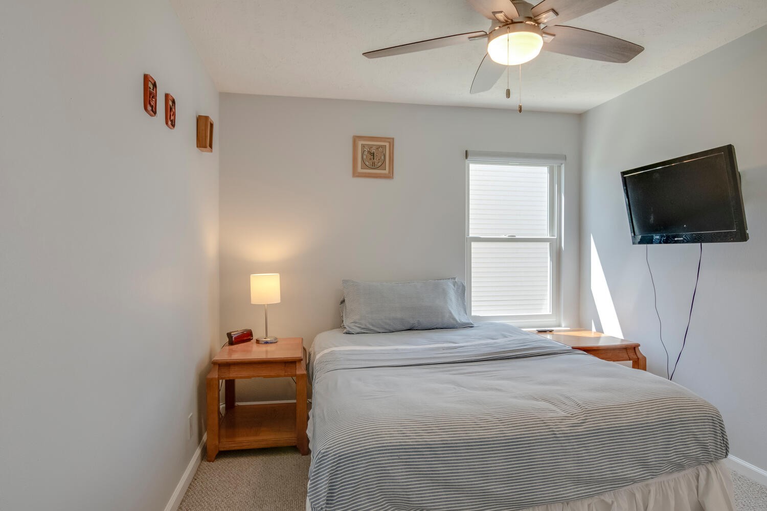 2112 Cason Trail Murfreesboro, TN 37128 - Photo 16 of 25 a bedroom with a bed and a flat screen tv