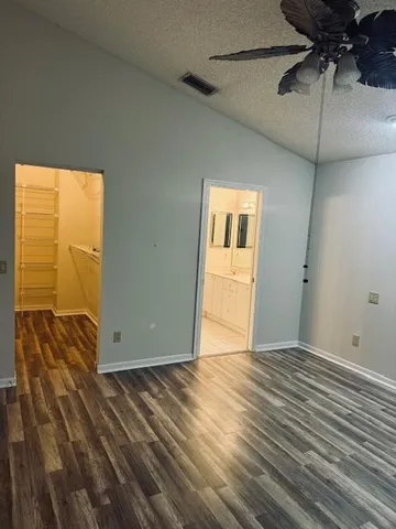 a view of a utility room and empty room