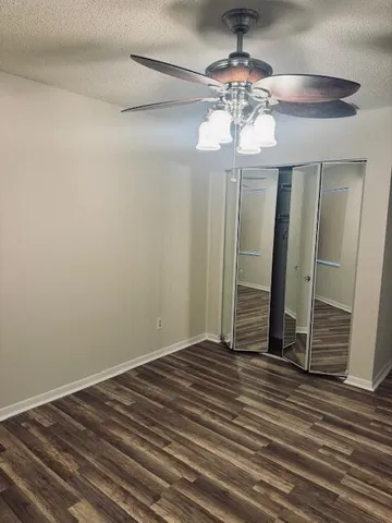 a view of a livingroom with wooden floor