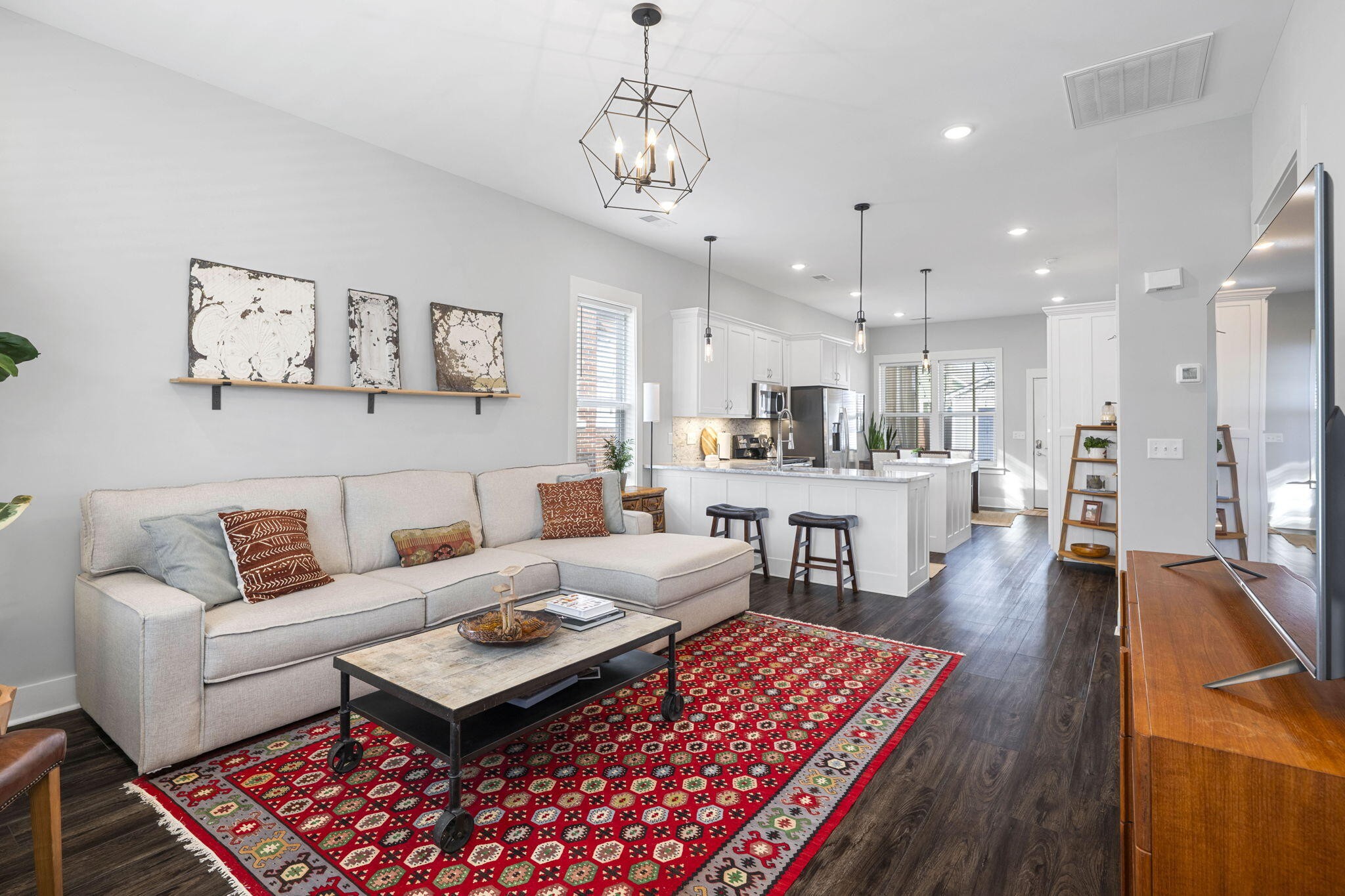 2115 Union Avenue Chattanooga, TN 37404 - Photo 19 of 54 a living room with furniture and a chandelier