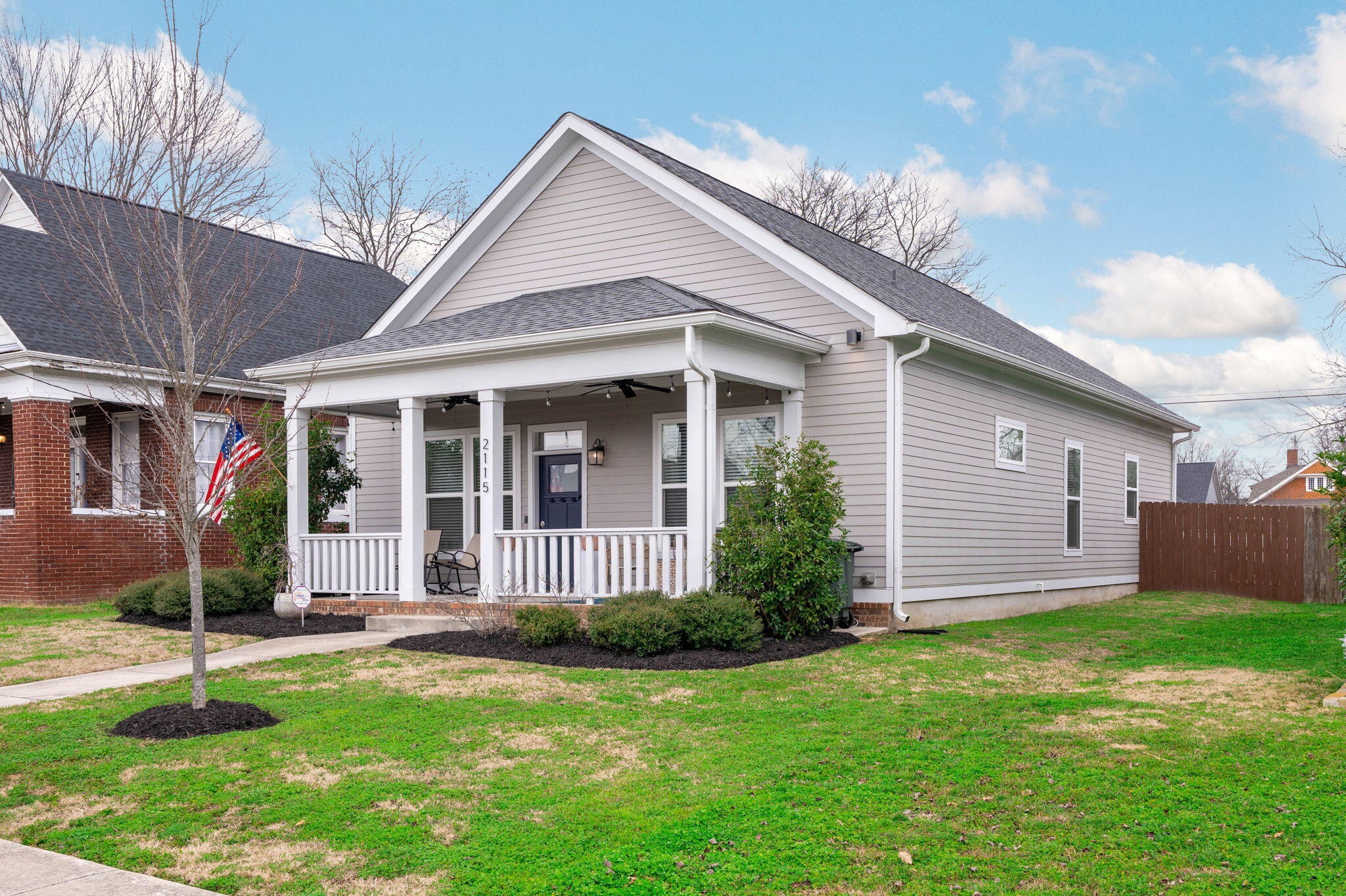 2115 Union Avenue Chattanooga, TN 37404 - Photo 6 of 54 a front view of a house with a yard and garage