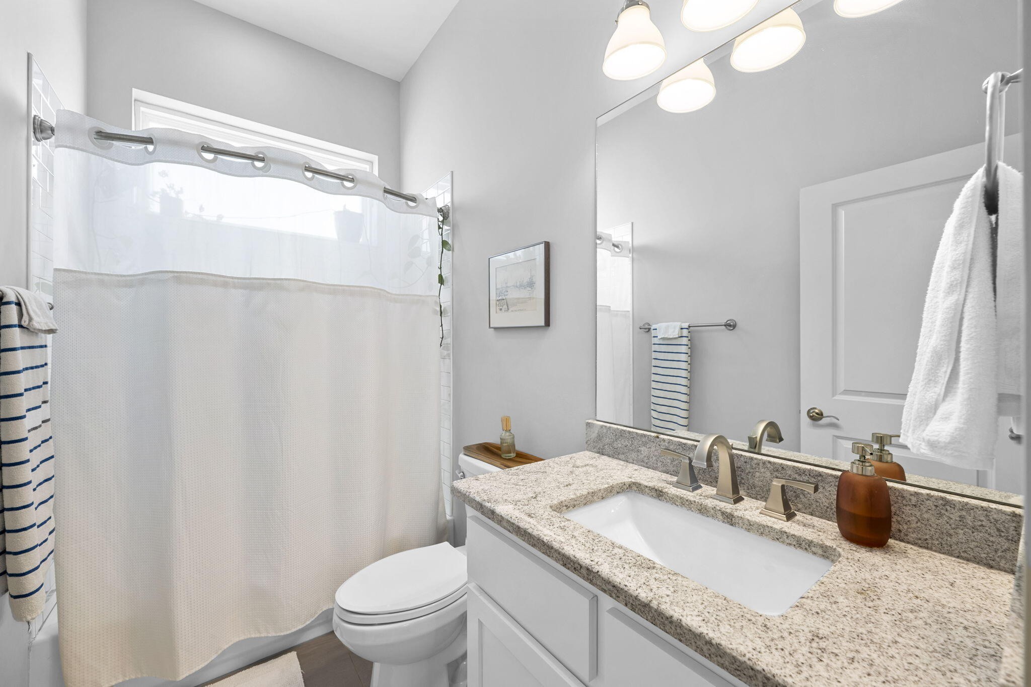 2115 Union Avenue Chattanooga, TN 37404 - Photo 10 of 54 a bathroom with a granite countertop sink toilet and shower