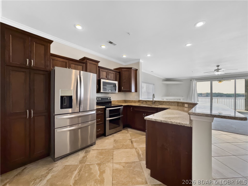 18136 Millstone Cove Road, Unit 141 Gravois Mills, MO 65037 - Photo 15 of 50 Kitchen/ Stainless Steel Appliances