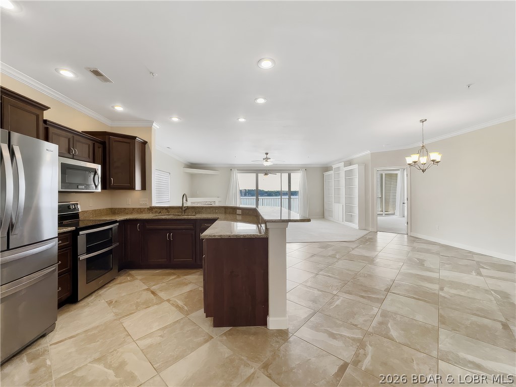 18136 Millstone Cove Road, Unit 141 Gravois Mills, MO 65037 - Photo 17 of 50 Kitchen/ Breakfast Bar