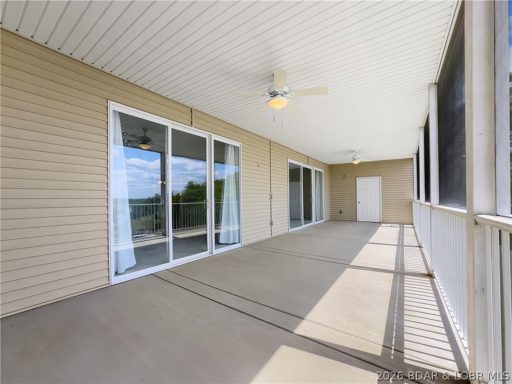 18136 Millstone Cove Road, Unit 141 Gravois Mills, MO 65037 - Photo 24 of 50 Large Screened Deck off Master Bedroom w/Storage C