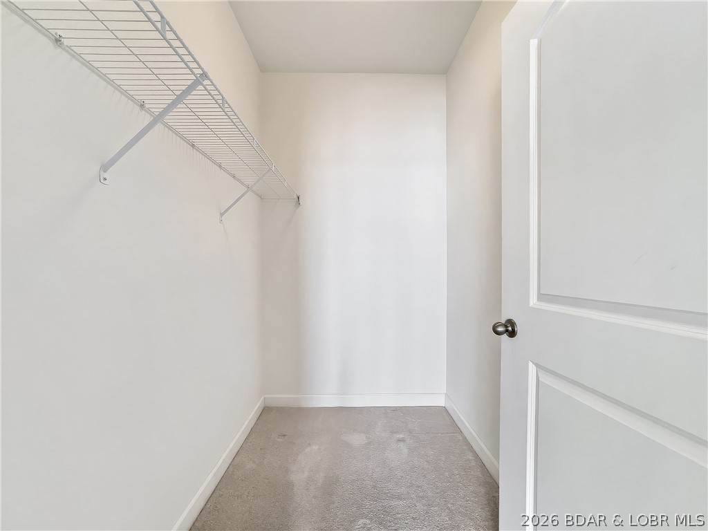 18136 Millstone Cove Road, Unit 141 Gravois Mills, MO 65037 - Photo 28 of 50 Walk-In Closet