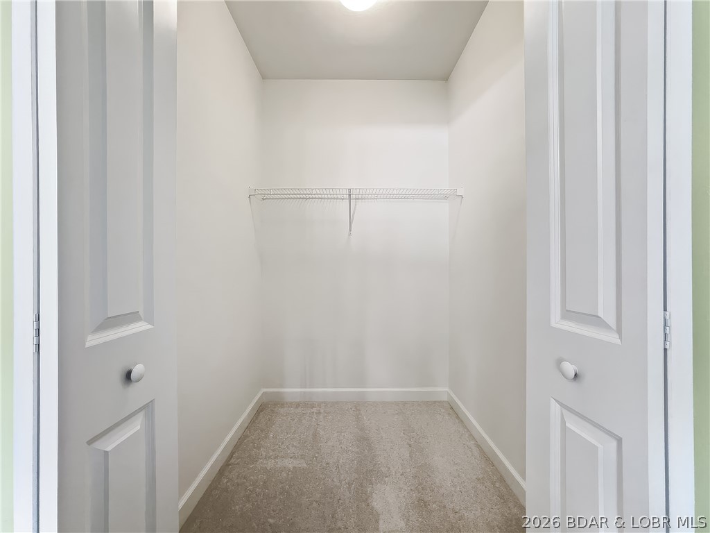18136 Millstone Cove Road, Unit 141 Gravois Mills, MO 65037 - Photo 32 of 50 Walk-In Closet