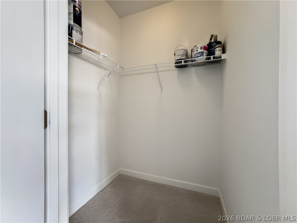 18136 Millstone Cove Road, Unit 141 Gravois Mills, MO 65037 - Photo 36 of 50 Walk-In Closet
