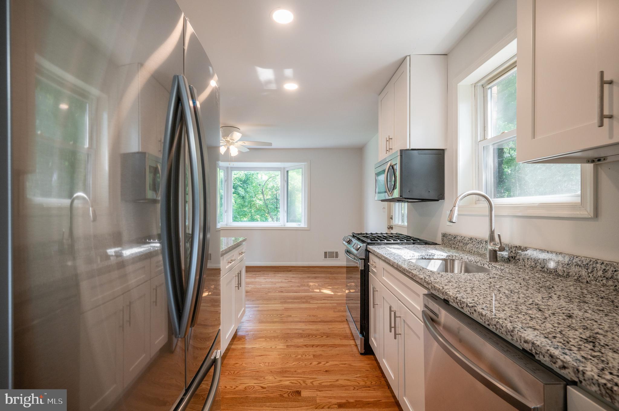 6002 River Road Bethesda, MD 20817 - Photo 11 of 39 Stainless Steel Appliance & Granite Counters