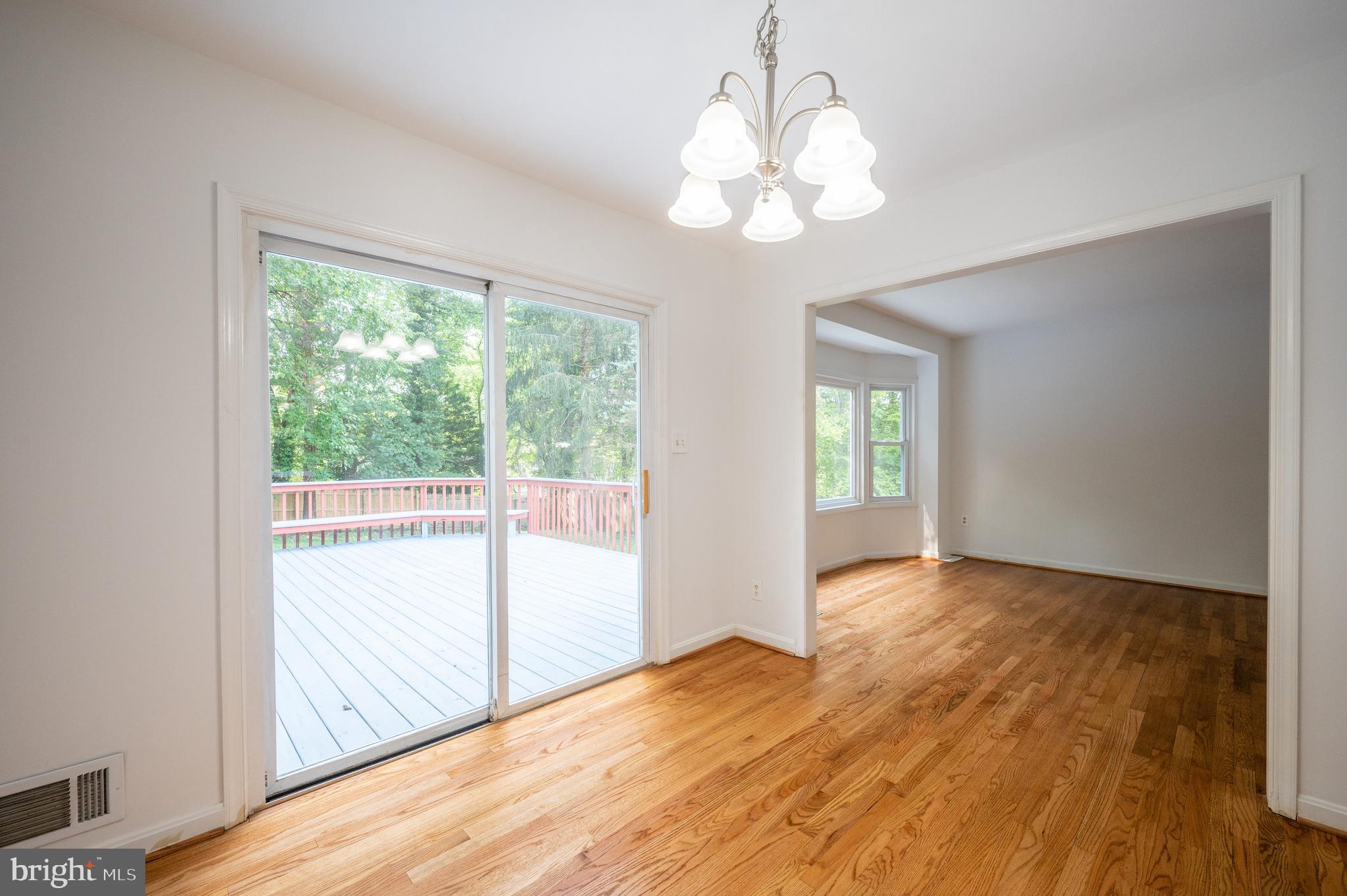 6002 River Road Bethesda, MD 20817 - Photo 12 of 39 Large Separate Dining Area Leads to Deck