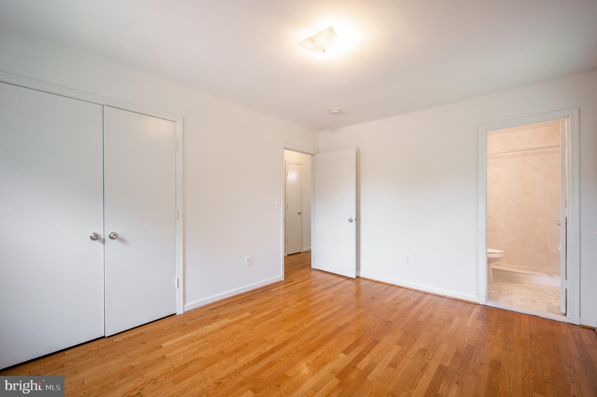 6002 River Road Bethesda, MD 20817 - Photo 16 of 39 Primary Bedroom with Lots of Closet Space