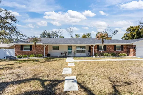 front view of a house with a patio