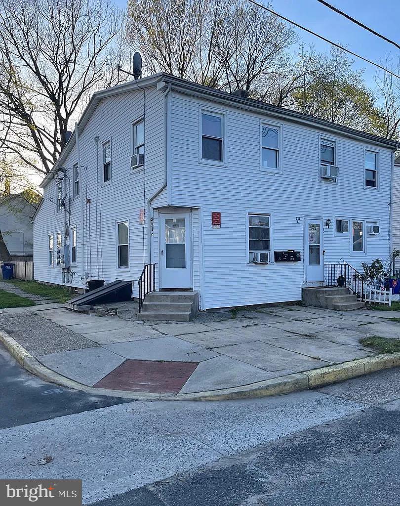 231 Broad Street, Unit B Beverly, NJ 08010 - Photo 1 of 9 a view of a house with a yard