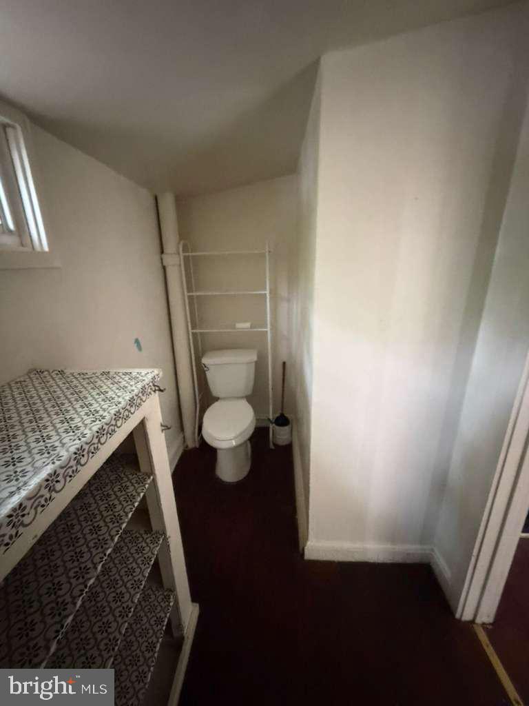 231 Broad Street, Unit B Beverly, NJ 08010 - Photo 6 of 9 a bathroom with a sink and a vanity