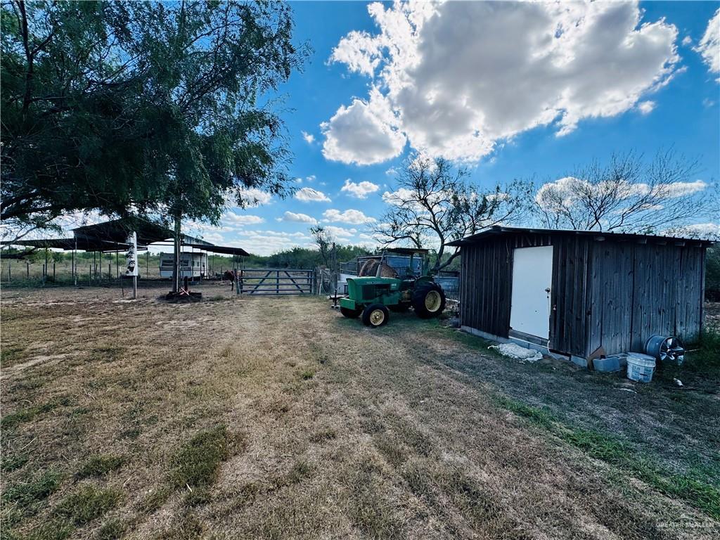 22417 Carrizales Road, Unit SERVICE Edinburg, TX 78542 - Photo 17 of 28 a view of a backyard