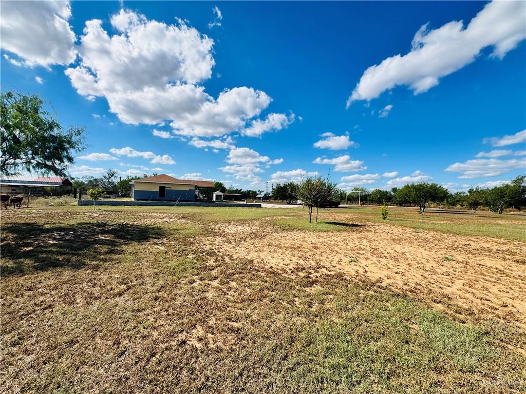 22417 Carrizales Road, Unit SERVICE Edinburg, TX 78542 - Photo 22 of 28 a view of a lake with houses in the background