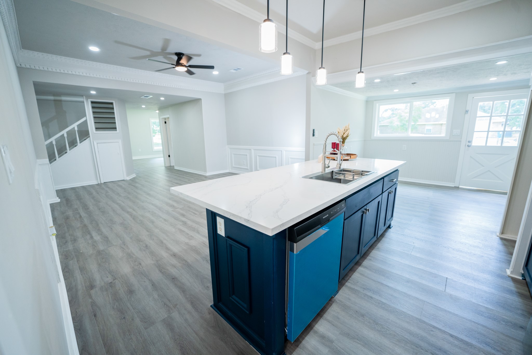 2145 16th Street Hempstead, TX 77445 - Photo 20 of 43 a kitchen with a sink and wooden floor