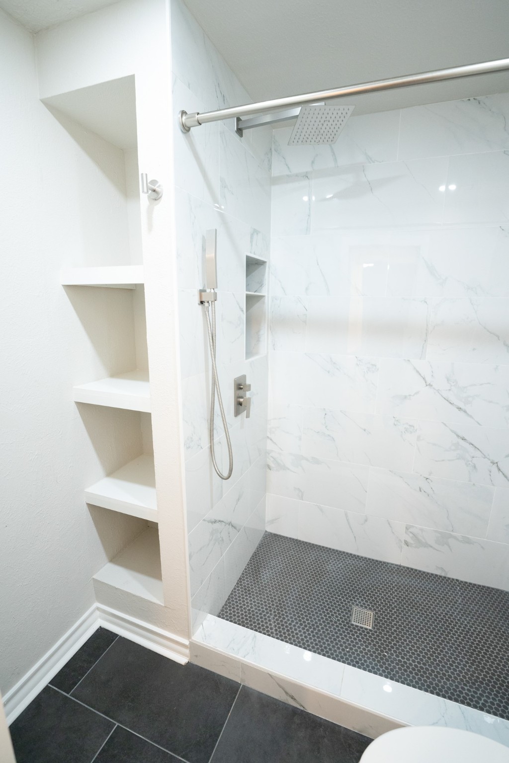 2145 16th Street Hempstead, TX 77445 - Photo 24 of 43 a bathroom with a shower