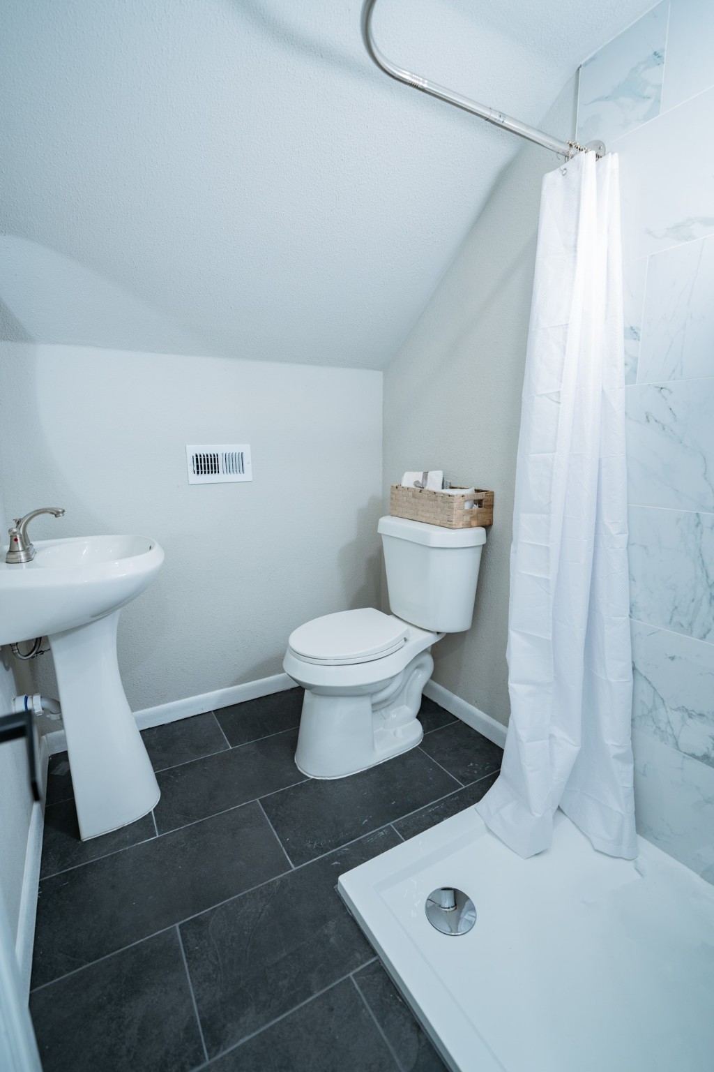 2145 16th Street Hempstead, TX 77445 - Photo 33 of 43 a bathroom with a sink toilet and a mirror