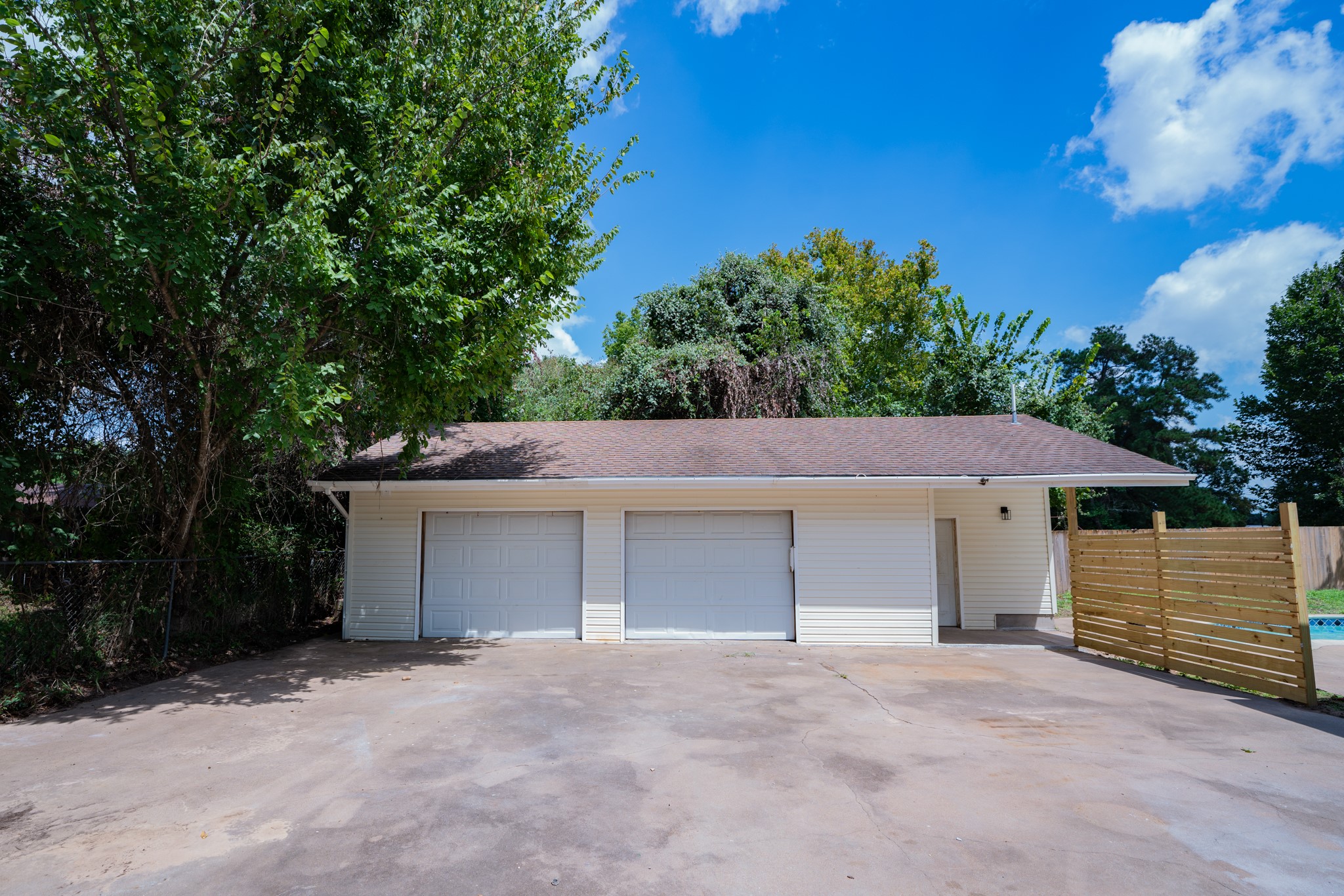 2145 16th Street Hempstead, TX 77445 - Photo 43 of 43 a front view of a house with a yard and garage