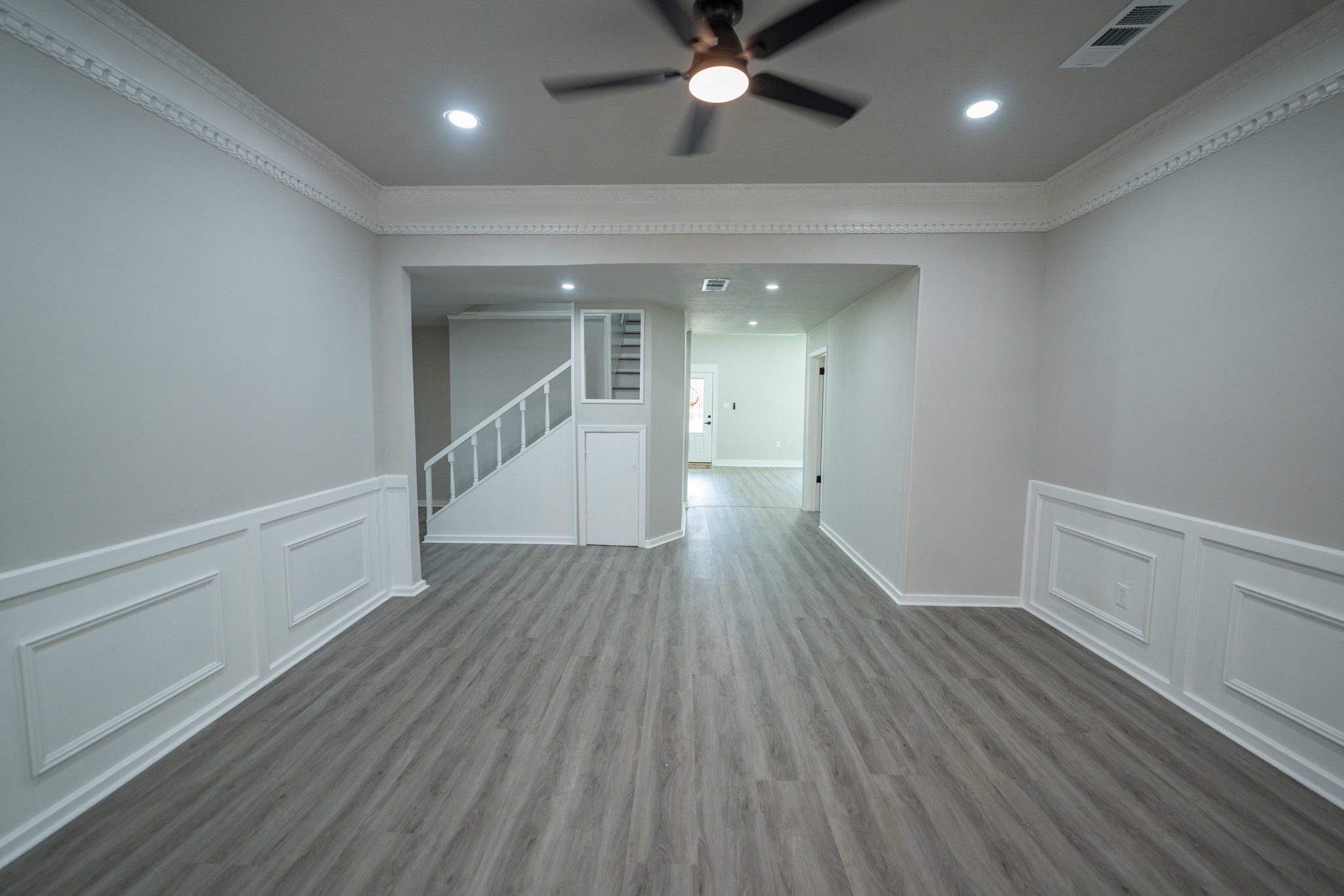 2145 16th Street Hempstead, TX 77445 - Photo 5 of 43 wooden floor in an empty room with a window