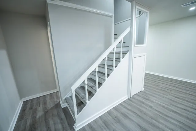 a view of entryway with wooden floor