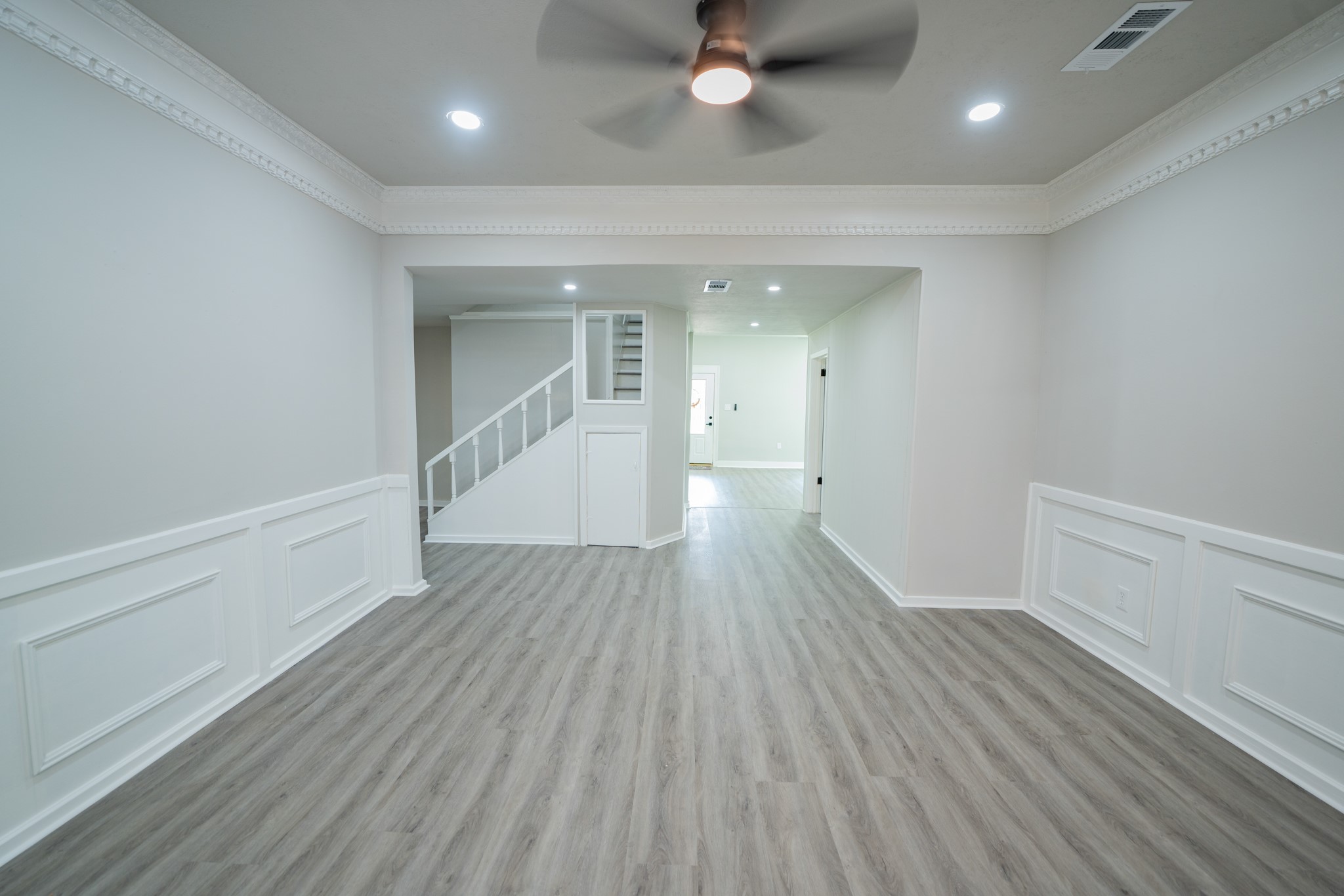 2145 16th Street Hempstead, TX 77445 - Photo 7 of 43 wooden floor in an empty room with a window