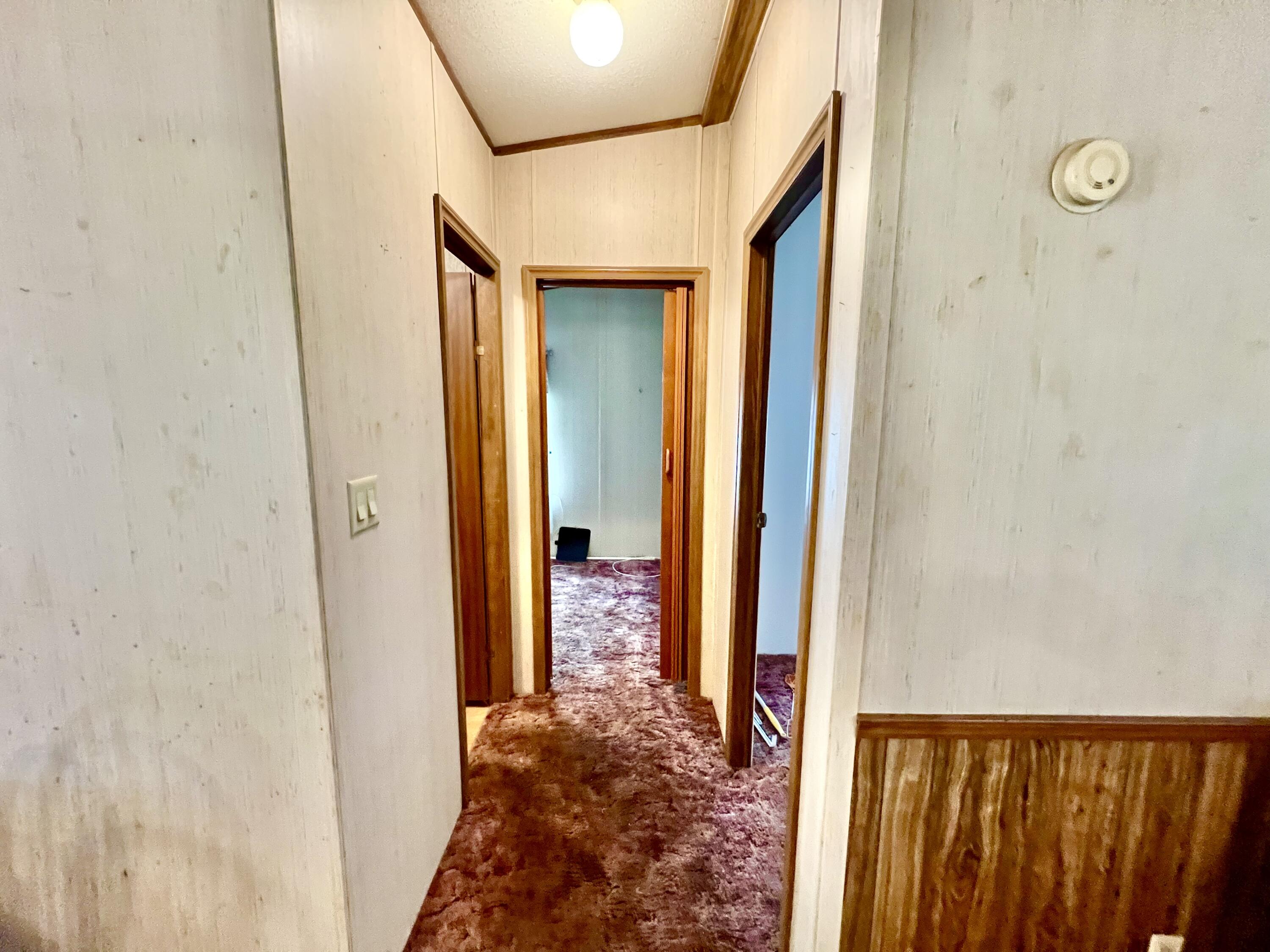 1303 Jordan Loop Okeechobee, FL 34974 - Photo 26 of 33 a view of a hallway
