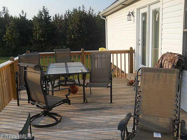 222 Pagetown Road Elon, NC 27244 - Photo 8 of 15 Patio/Deck. Great deck for grilling and enjoying a good book!