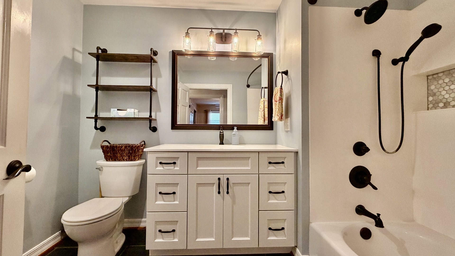 1931 West 4th Street Centralia, IL 62801 - Photo 11 of 15 a bathroom with a toilet a sink and a mirror