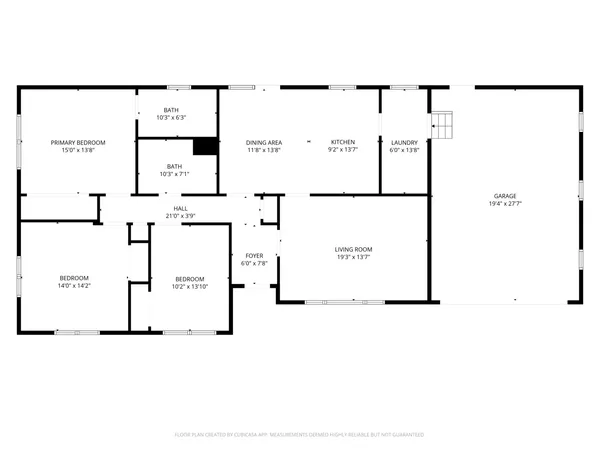 a picture of a bench in front of a gate