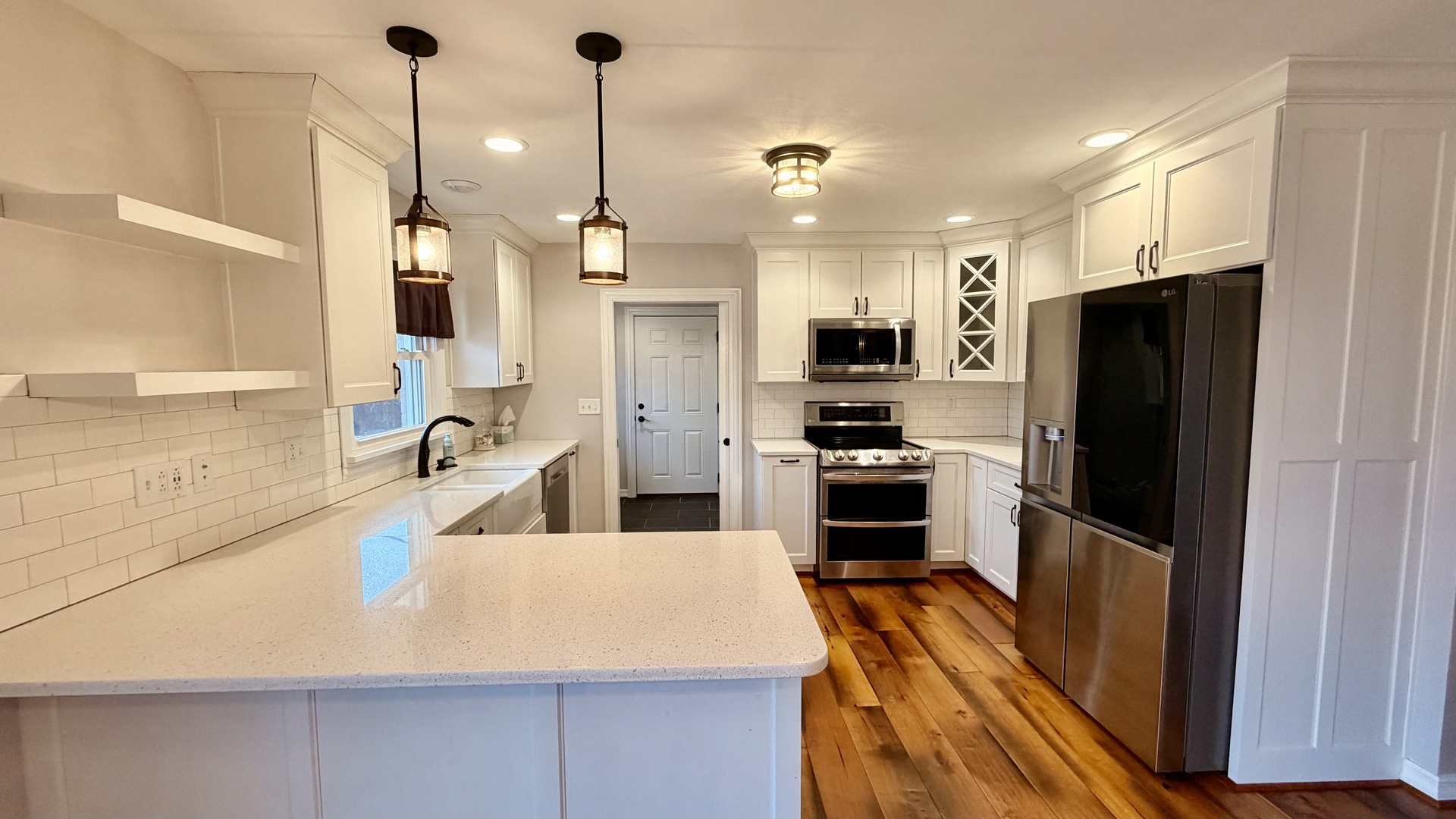 1931 West 4th Street Centralia, IL 62801 - Photo 6 of 15 a kitchen with stainless steel appliances a refrigerator sink and microwave