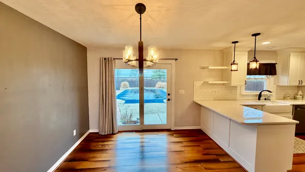a kitchen with sink and window