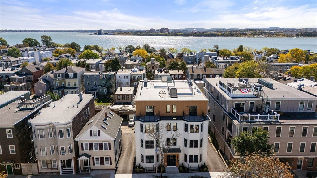 527 East 7th Street, Unit 1 Boston, MA 02127 - Photo 22 of 24 a view of a city with lawn chairs