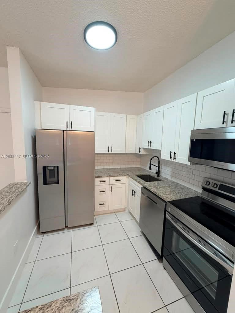 9499 West McNab Road, Unit 208 Tamarac, FL 33321 - Photo 3 of 6