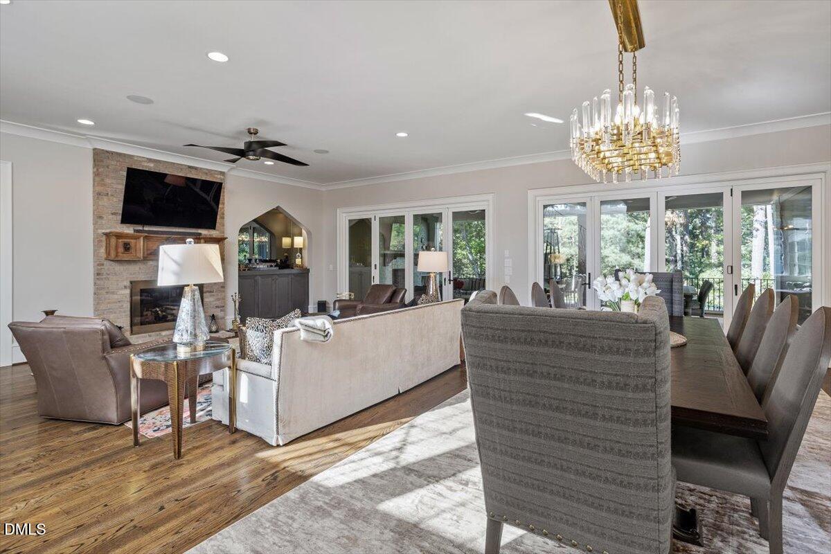 1617 Ridge Road Raleigh, NC 27607 - Photo 15 of 68 a living room with fireplace furniture and a chandelier