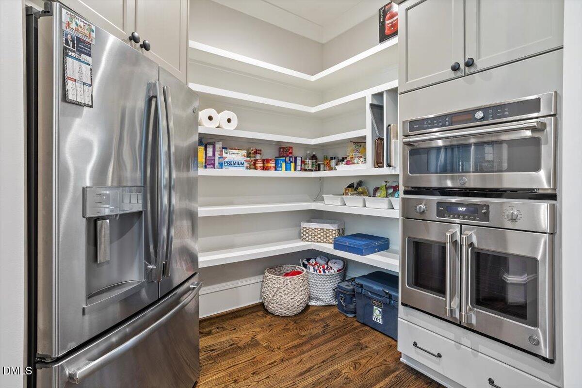 1617 Ridge Road Raleigh, NC 27607 - Photo 33 of 68 a kitchen with a refrigerator stove and a sink