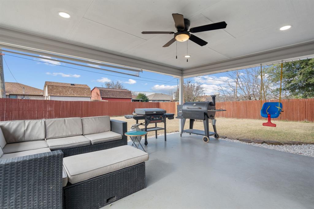 7629 Cedarhill Road Watauga, TX 76148 - Photo 27 of 33 Expansive covered patio featuring a ceiling fan, recessed lighting, concrete flooring, and a gravel border