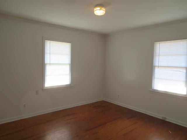 6386 Highway 209 Ripley, TN 38063 - Photo 14 of 23 Bedroom with crown molding and dark wood-style flooring